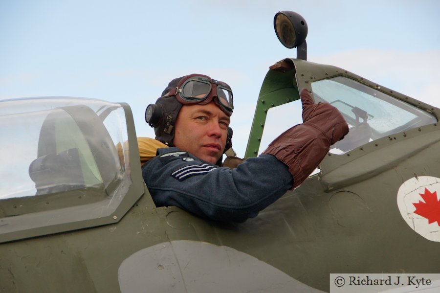 Richard Minney from the Allied Assortment re-enactment, in the cockpit of a replica Spitfire, Wartime in the Vale 2015