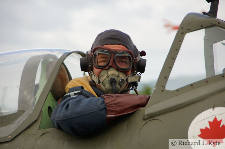 Richard Minney from the Allied Assortment re-enactment, in the cockpit of a replica Spitfire, Wartime in the Vale 2015