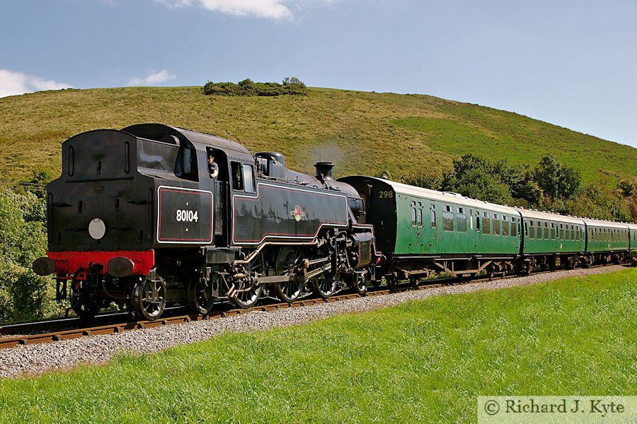 BR Standard Class 4MT 2-6-4T no. 80104 heads for Norden at Corfe Castle, Swanage Railway
