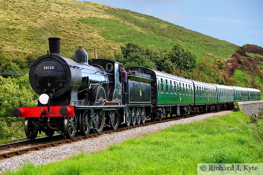 SR/LSWR T9 Greyhound class no. 30120 heads for Norden at Corfe Castle, Swanage Railway