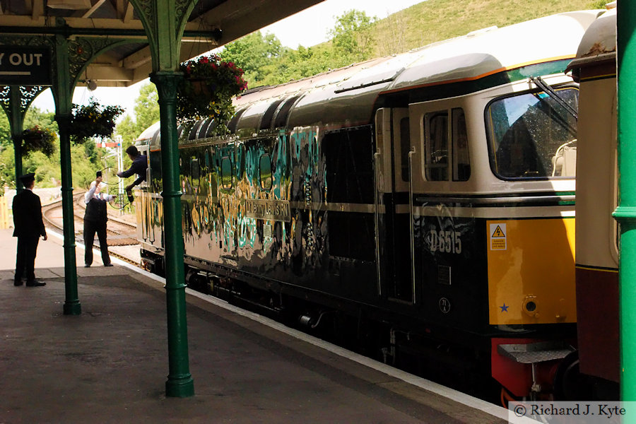 Class 33 diesel no. D6515 (TOPS 33012) "Lt Jenny Lewis RN" arrives at Corfe Castle Station, bound for Norden, Swanage Railway