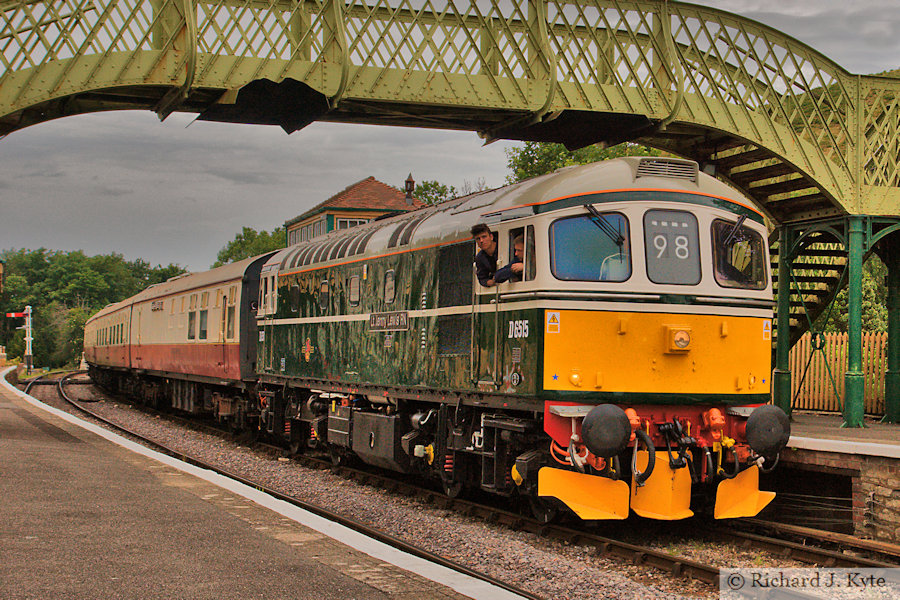 Class 33 diesel no. D6515 (TOPS 33012) "Lt Jenny Lewis RN" arrives at Corfe Castle Station, bound for Swanage